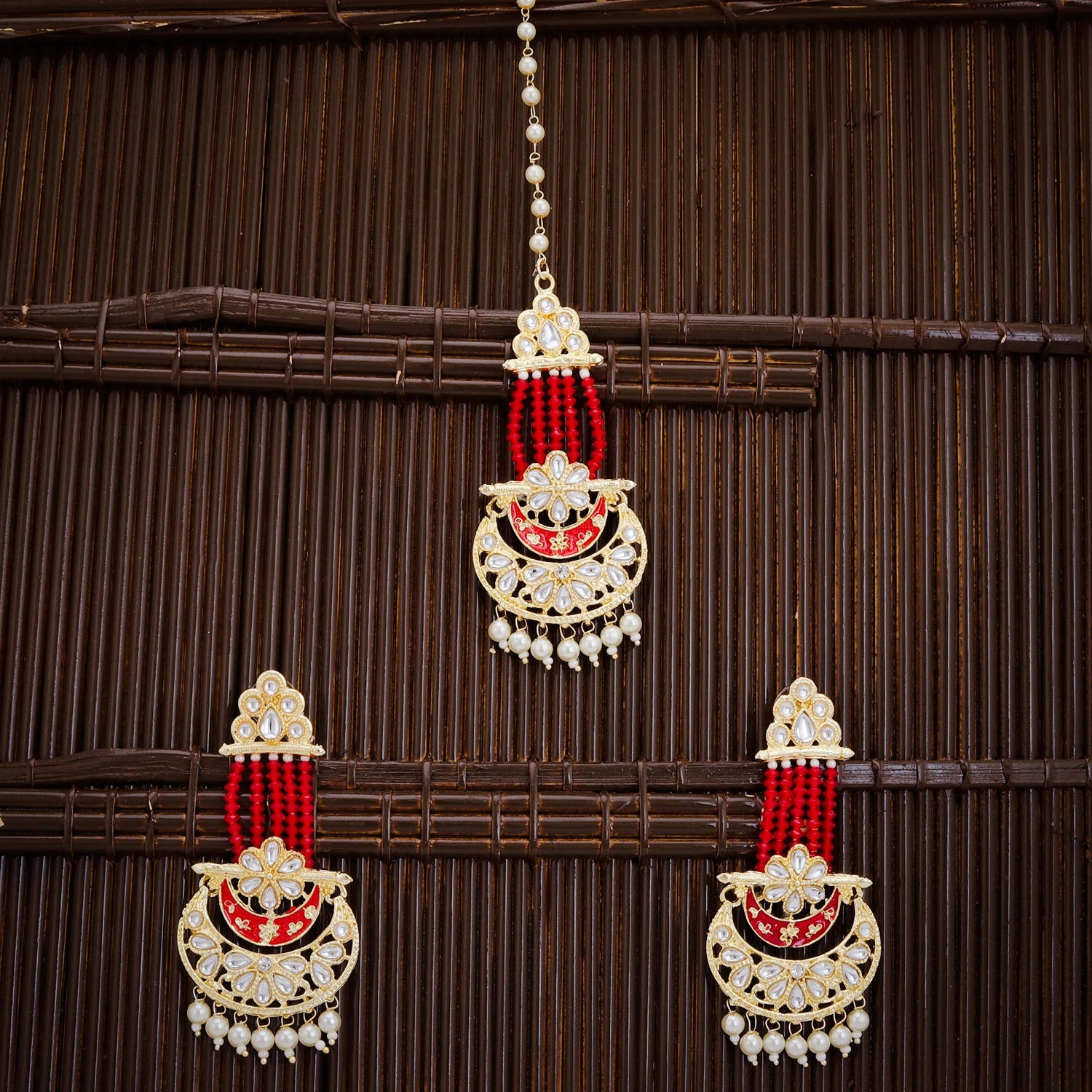 Glistening Kundan Gold Plated Pearl Earring With Maang Tikka